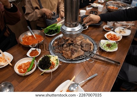 Local traditional korean gourmet food black pig of Jeju Island for grilled roasted barbecue pork and seasoning side dish for korean people taste eat drinks cuisine in local restaurant at South Korea Royalty-Free Stock Photo #2287007035