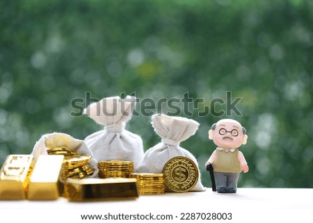 Mutual fund,Senior man and gold coin money in the bag on natural green background, Save money for prepare in future and pension retirement concept