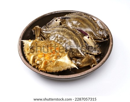 Close-up of three Ganjang-gejang(Soy Sauce Marinated Crab) with fresh on crab lid and legs on a jar, South Korea
 Royalty-Free Stock Photo #2287057315