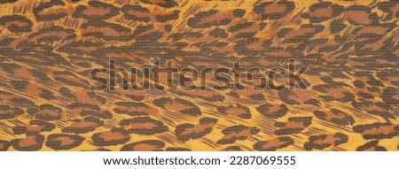 silk fabric, leopard skin, brown-yellow black tones, hot African safari for your projects, texture background, pattern