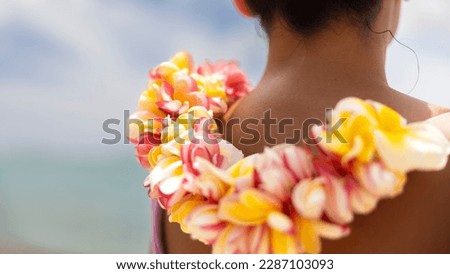 Woman making Hawaiian Lei and Hahu. Process of Handmade flower crown made from Hawaii flower Plumeria. Royalty-Free Stock Photo #2287103093