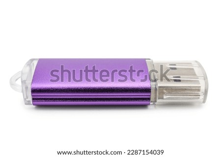 Purple USB flash drive on white background