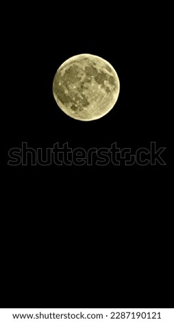 Super full moon in a dark sky.