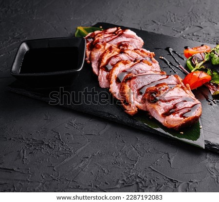 Japanese tataki beef filet with lettuce and tomatoes Royalty-Free Stock Photo #2287192083