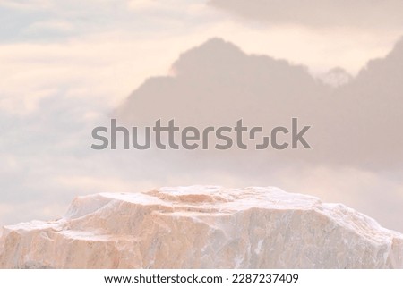 Surreal natural rough white beige mable stone podium on cloud mountain nature landscape background with space.Cosmetic beauty product placement pedestal rock stand display,minimal dreamy concept. Royalty-Free Stock Photo #2287237409