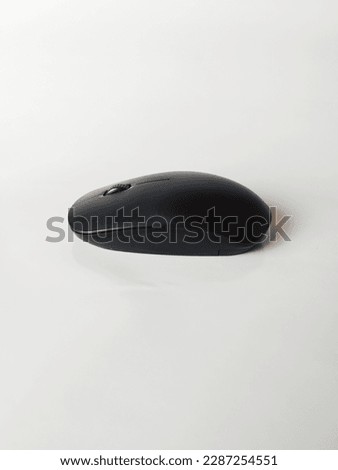 Beside view of computer mouse on the white background