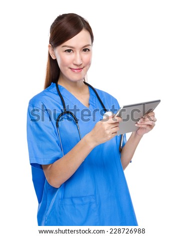 Doctor woman use tablet
