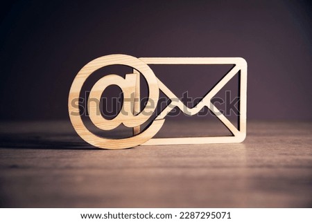 wooden letter with email sign	