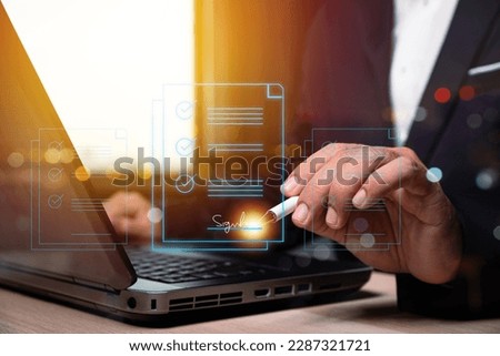 man hand sign document on virtual screen , business contract electronic signature, e-signing, digital document management