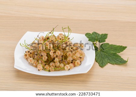 White currant with fresh leaves