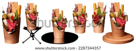 Charcuterie cups with assorted cheese, salami, olives and nuts. Appetizers cups, Snack cups, Charcuterie cones. Isolated Royalty-Free Stock Photo #2287344357