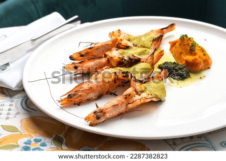Grilled King Tiger Prawn with sauce food concept.