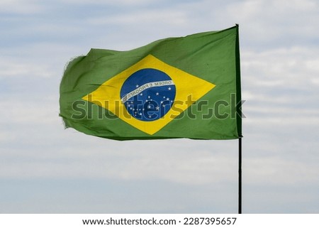 Rio, Brazil - March 05, 2023: brazilian flag on sky background fluttering and fully open