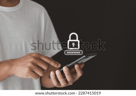 Asian man hand using the smart mobile phone to access on smartphone for validate password for biometric two steps authentication to unlock security, Business Technology Cyber Security Concept. Royalty-Free Stock Photo #2287415019