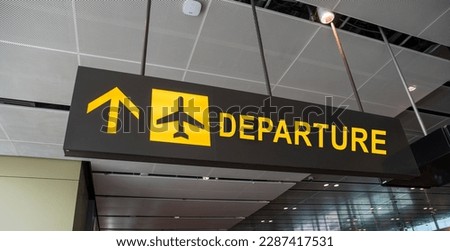 Departure airport sign - holiday and tourism concept.
