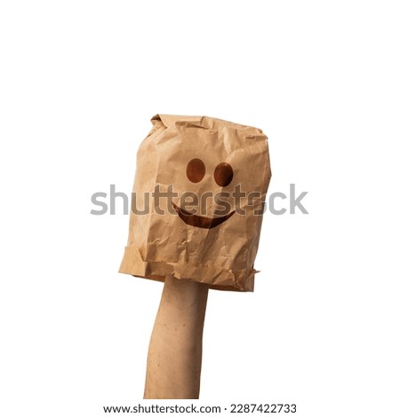 paper bag with drawn happy face isolated on white background