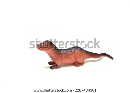 Plastic sea otter plastic animal toy. Isolated. On white background. Isolated. Suitable for children