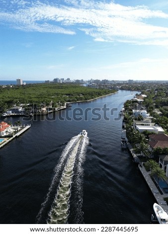 Aerial shot of Fort Lauderdale and canals with boats, Magical view on the river
