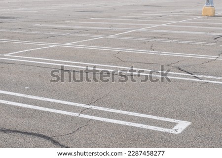 A completely empty, blank parking lot