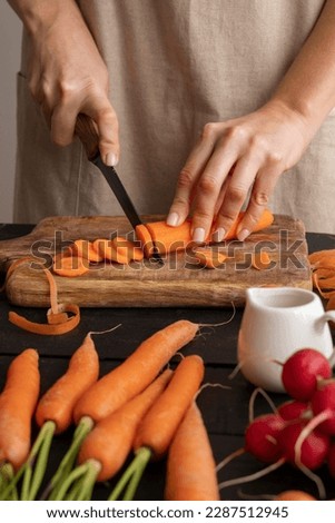 chopped carrot, chopping carrots. cut fresh ripe carrots. cutting carrots. Carrot slice. Sliced carrots. Carrot slices. Royalty-Free Stock Photo #2287512945