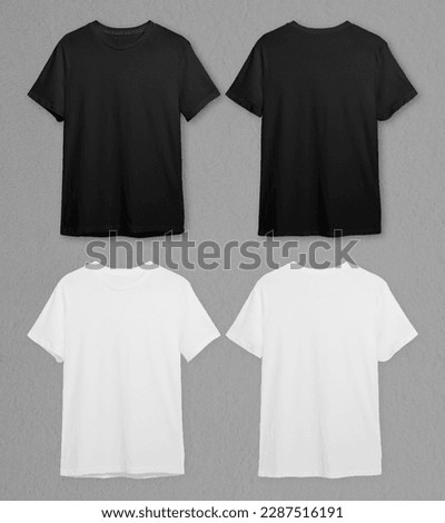 Black and White T Shirt With Grey Background Royalty-Free Stock Photo #2287516191