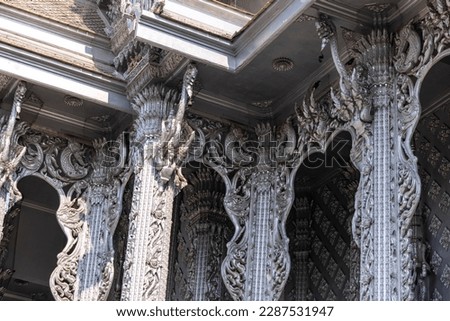 Traditional Thai style stucco on building in Thai temple