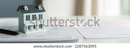 Property investment concept, image of small house model on the table.
 Royalty-Free Stock Photo #2287563095