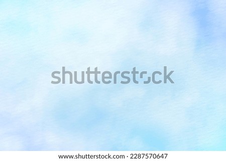 

A textured paper with a cool watercolor mottled background in shades of blue. Royalty-Free Stock Photo #2287570647