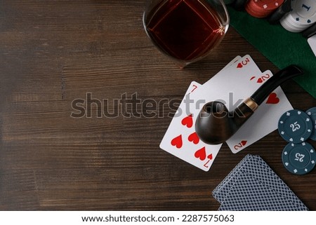 Concept of relaxation with smoking tobacco, drinking alcohol and play poker