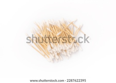 Cotton swabs isolated on white background. Bamboo cotton buds. Means for hygiene of ears. Eco friendly materials.