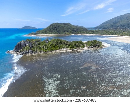 Aerial view of beautiful Anse l'Islette lagoon in Mahe island, Seychelles