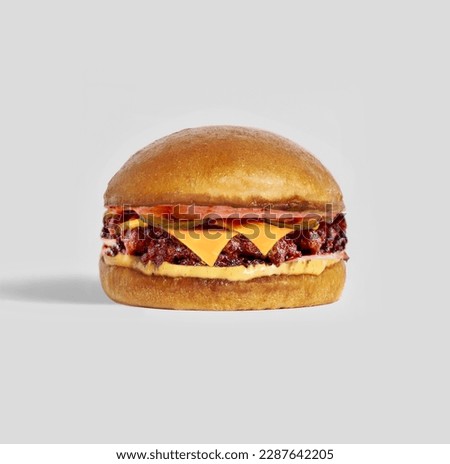 delicious Smash Burger with cheese  in a white background   Royalty-Free Stock Photo #2287642205