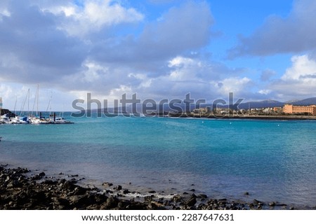Winter sea and sun vacation in Caleta de Fuste touristic village on Fuerteventura, Canary islands, Spain
