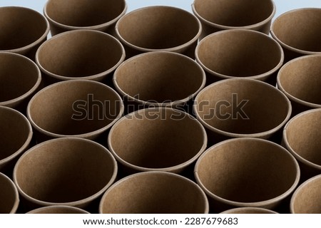 Empty disposable paper coffee cups for background