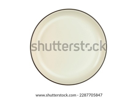 Empty brown ceramic dish. Top view of ceramic plate with dark edge isolated on white background with clipping path. Royalty-Free Stock Photo #2287705847