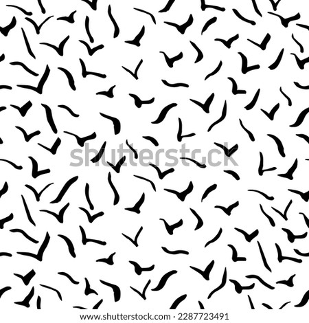 
A flock of flying birds isolated on a white background. Vector. Handwritten doodles.