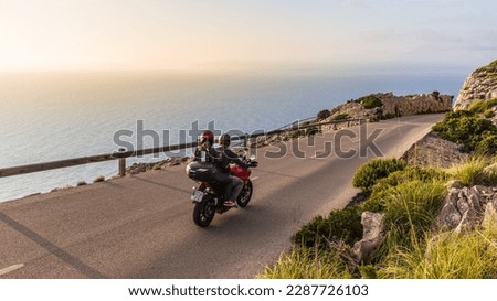 Motorbikes on the road on the seashore. Royalty-Free Stock Photo #2287726103