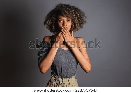 Brazilian black woman, posing for a photo, feminism, fight against racism and domestic violence. Power women. Royalty-Free Stock Photo #2287737547