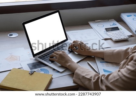 mockup image blank screen computer with blank white background for advertising text, hand woman using laptop contact business search information on desk at home office. marketing and creative design