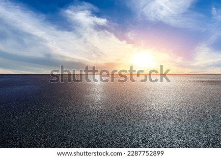 Asphalt road and sky clouds landscapes at sunrise
