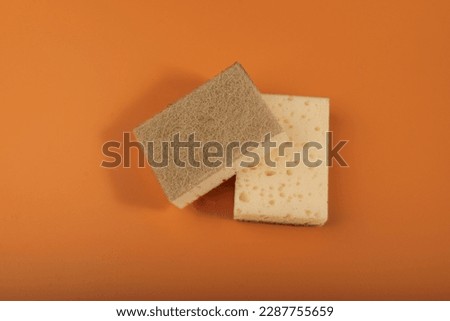 Natural Sponge, Eco Brown Sponges, Eco Friendly Hygiene Accessory, Scotch Brite Dishwasher on Yellow Background