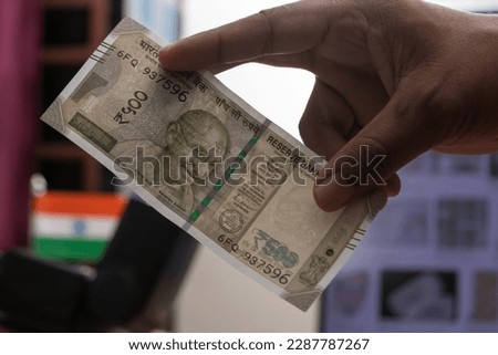 Indian currency note fake or Real Checking close up photos, indian rupees Royalty-Free Stock Photo #2287787267