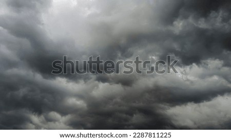 Sky and black cloud. Dark grey storm clouds. Dramatic sky. lighting in dark stormy cloudy. B Horrible weather, in Brazil Royalty-Free Stock Photo #2287811225