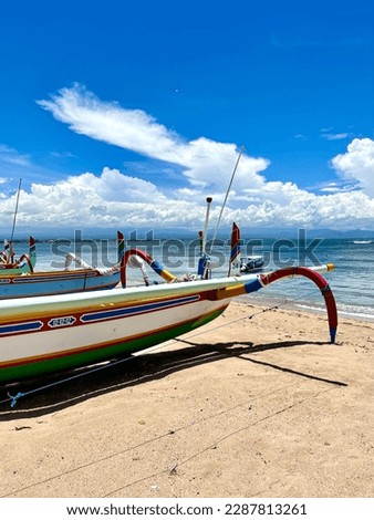 Traditional Fishing Boats are anchored on the beach