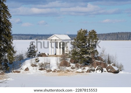View of the Temple of Neptune pavilion on a March afternoon. The old manor Monrepos in the vicinity of Vyborg. Leningrad region, Russia Royalty-Free Stock Photo #2287815553
