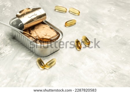 Cod liver Canned seafood and Cod liver oil capsules. Health care concept. Natural source of omega 3