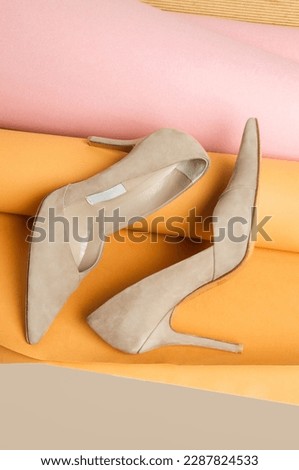 Creative studio shot of suede leather pumps with the classy pointed toe, product photography