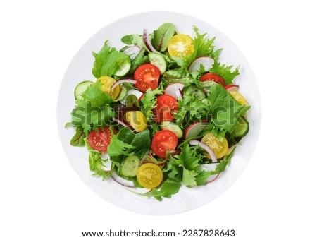 plate of salad with fresh vegetables isolated on white background, top view Royalty-Free Stock Photo #2287828643