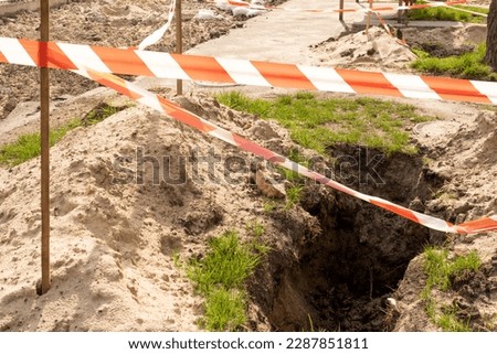 Road works on the street, significant damage to the highway, repair of engineering communications paths
