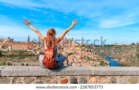 Woman enjoying panoramic view of Toledo city - Tourism in Spain, Travel in Europa Royalty-Free Stock Photo #2287853773